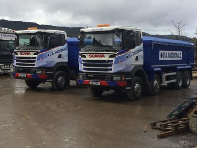 2 blue and white Scania 8 wheel tipper lorries