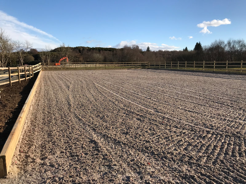 A site that has been spread and levelled very neatly with a nice blue sky in the background, with just a suggestion of a cloud to the left hand side of the photo